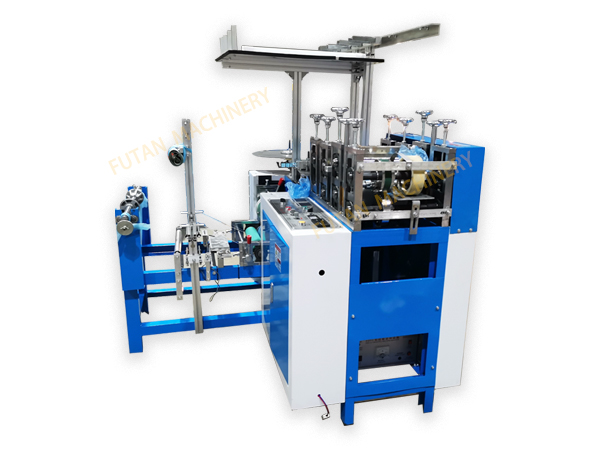 Plastic shoe cover machine